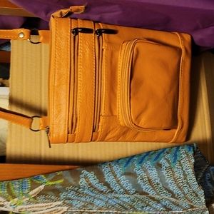 2  crossbody Ladies hand bags  .